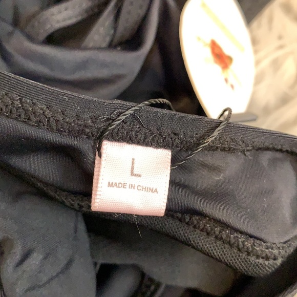 NWT Beach Queen black swim suit. Low cut halter with side cutouts - Picture 6 of 6